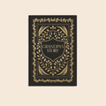 Book titled 'Grandpa's Story' with decorative gold design on a beige background