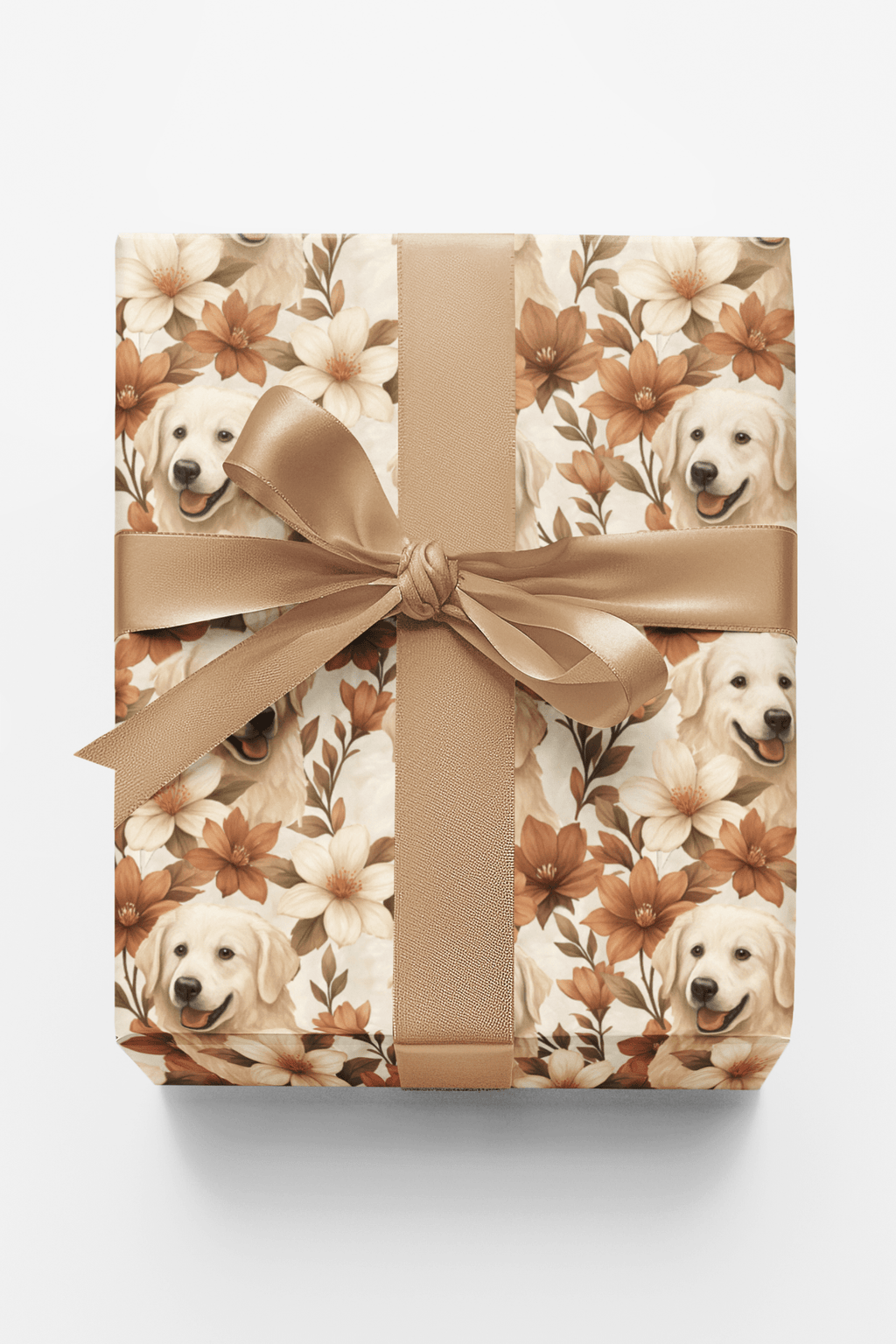 Gift box with floral pattern and dog images tied with a ribbon on a white background